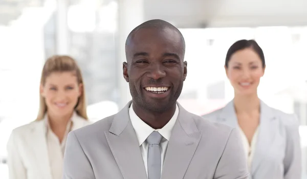 Charming afro-american manager with his team — Stock Photo, Image