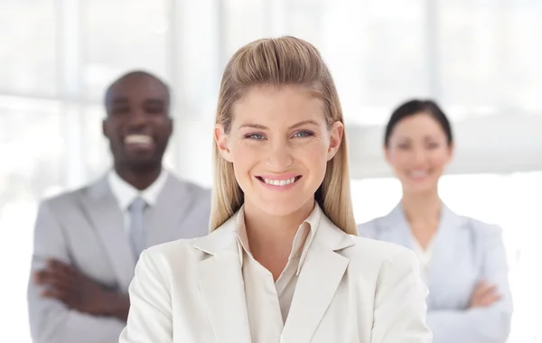 Radiant female manager with her team — Stock Photo, Image