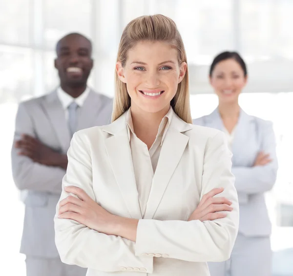 stock image Smiling female manager with her team