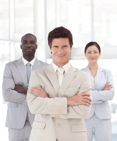 Serious male manager with his team — Stock Photo, Image
