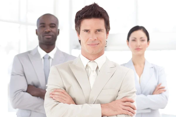 Young male manager with his team — Stock Photo, Image