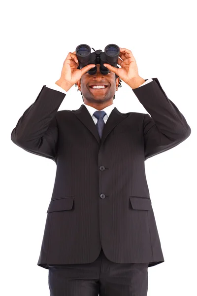 Smiling Afro-American businessman with binoculars — Stock Photo, Image