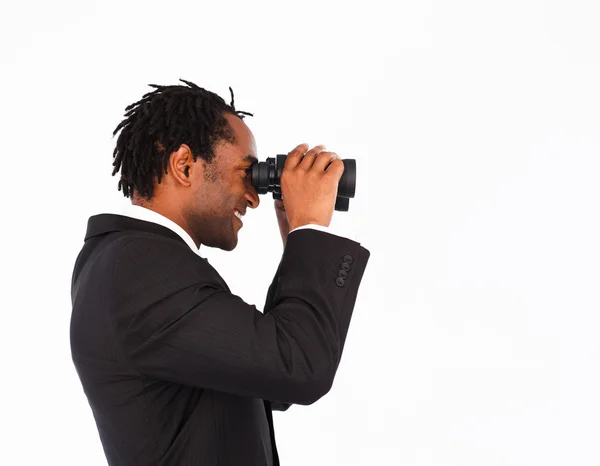 Empresário afro-americano com binóculos — Fotografia de Stock