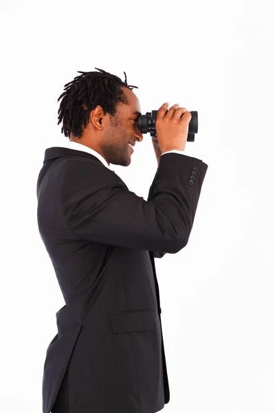 Empresário afro-americano sério com binóculos — Fotografia de Stock