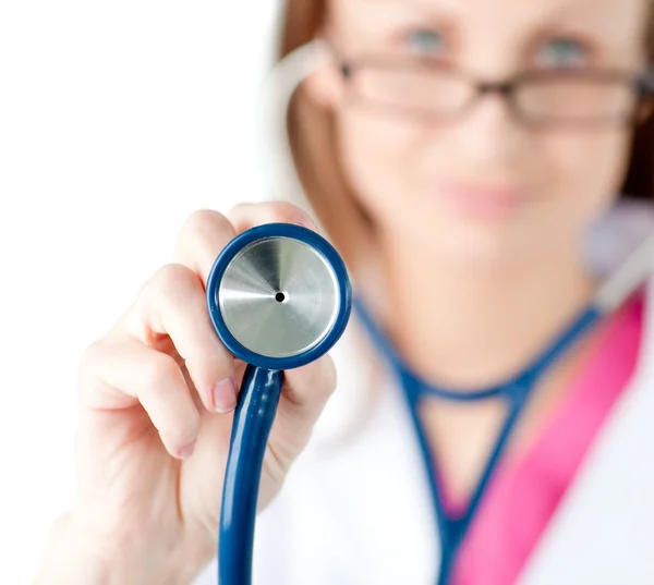 Close-up of a female doctor showing a stethoscope — Stock Photo, Image