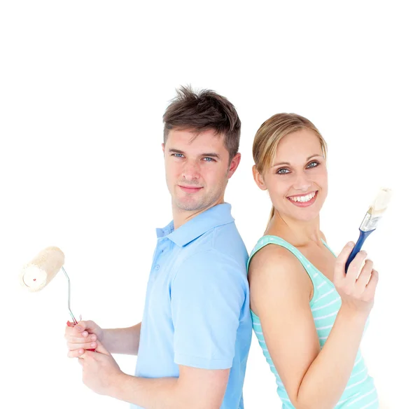 Charming couple smiling at the camera — Stock Photo, Image