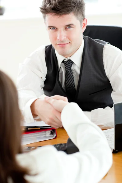 Handsome businessman closing a deal — Stock Photo, Image