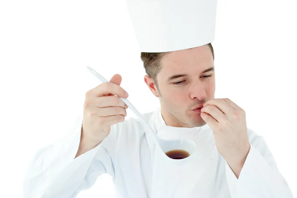 Enthusiastic cook holding a soup — Stock Photo, Image