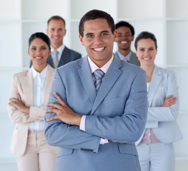 Smiling businessman leading his team — Stock Photo, Image