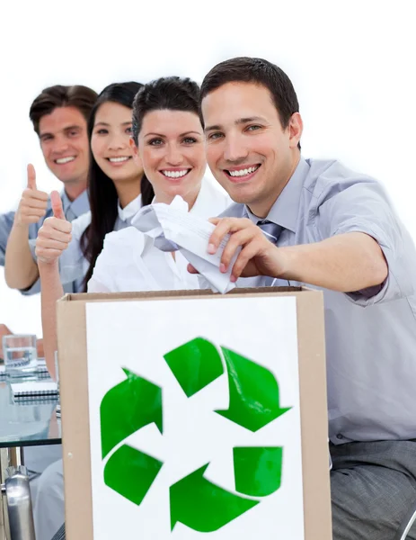 Young business showing the concept of recycling — Stock Photo, Image