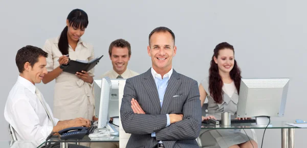 Concentrated Business partners working with their manager — Stock Photo, Image