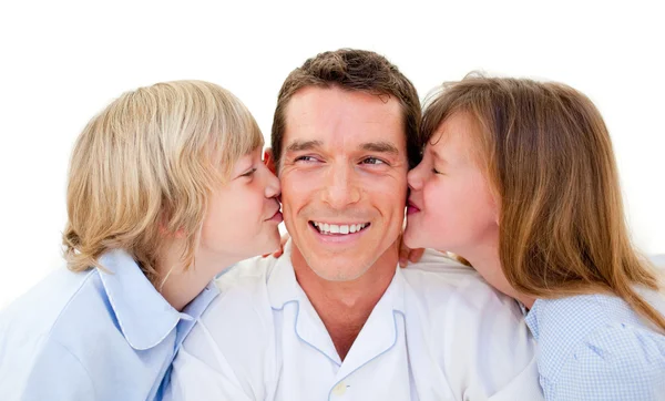 Cute siblings kissing their father — Stock Photo, Image