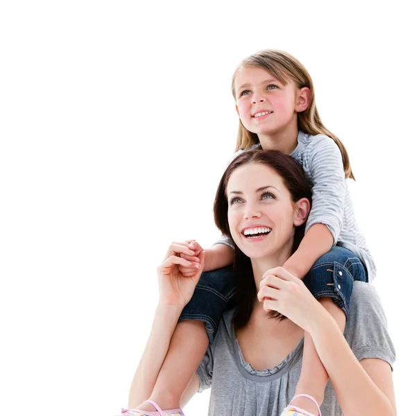 Cheerful mother giving piggyback ride to her daughter — Stock Photo, Image