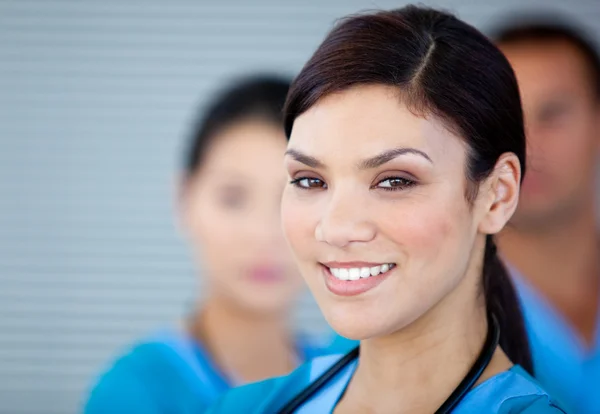 Portrait of a charismatic female doctor looking at the camera — Stock Photo, Image