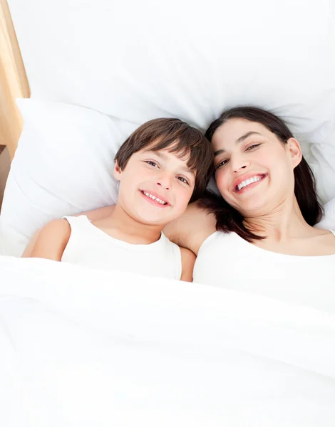 Smiling mother and her son lying — Stock Photo, Image
