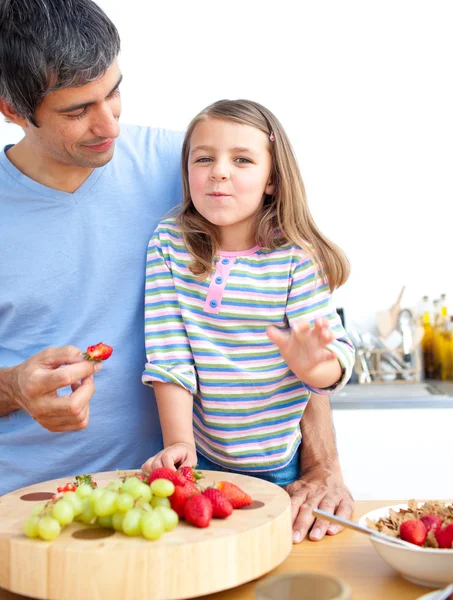 Little girl and her father having breakfast — Stock Photo, Image