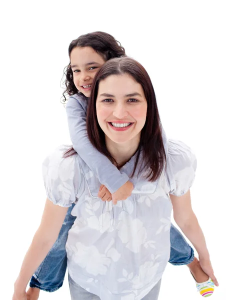 Lively mother giving her daughter piggyback ride — Stock Photo, Image