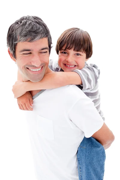 Close-up of father giving his son piggyback ride — Stock Photo, Image