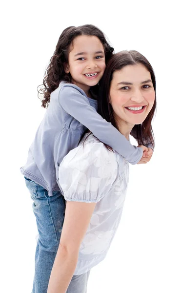 Cheerful mother giving her daughter piggyback ride — Stock Photo, Image