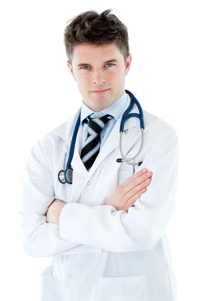 Retrato de um jovem médico masculino segurando um estetoscópio contra um fundo branco — Fotografia de Stock