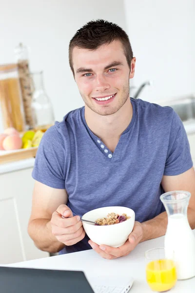 Charming man having breakfast — Stock Photo, Image
