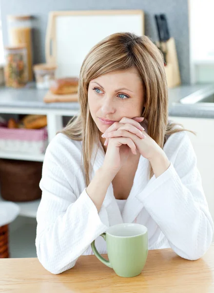 Thinking woman with a cup — Stock Photo, Image