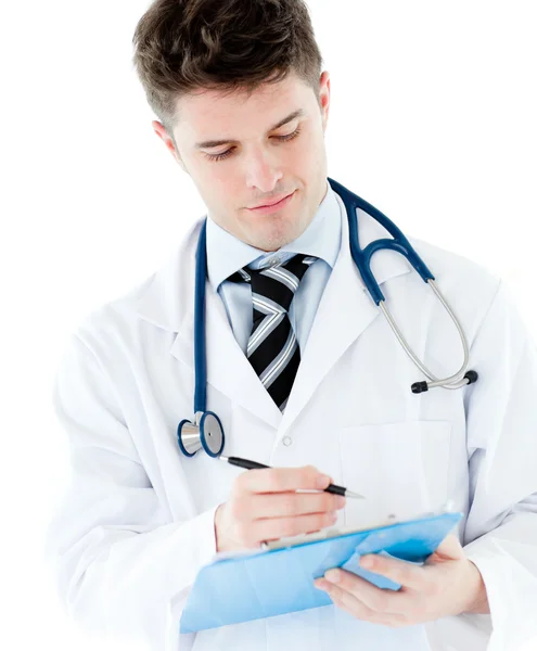 Attractive doctor holding pen — Stock Photo, Image