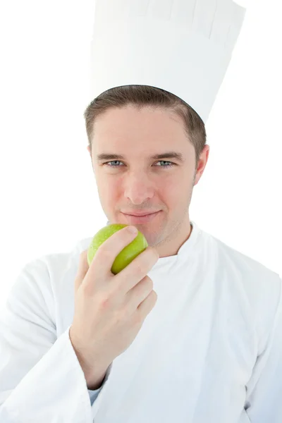 Cuisinier tenant une pomme verte — Photo