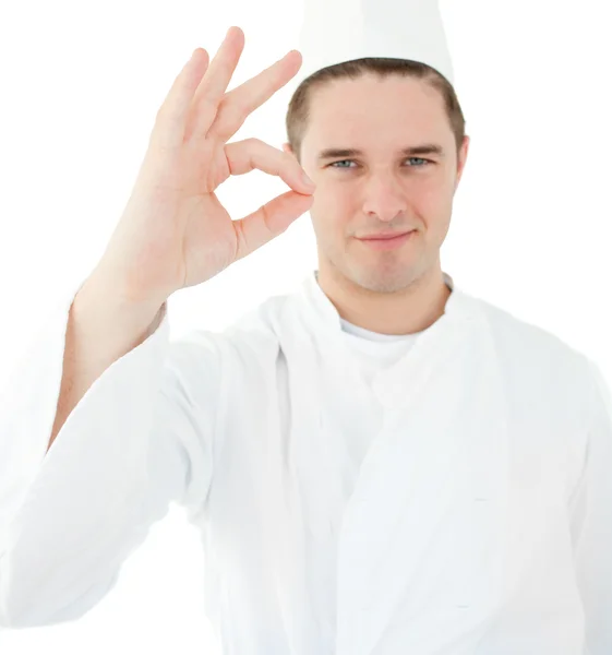 Jovem cozinheiro dando sinal de mão — Fotografia de Stock