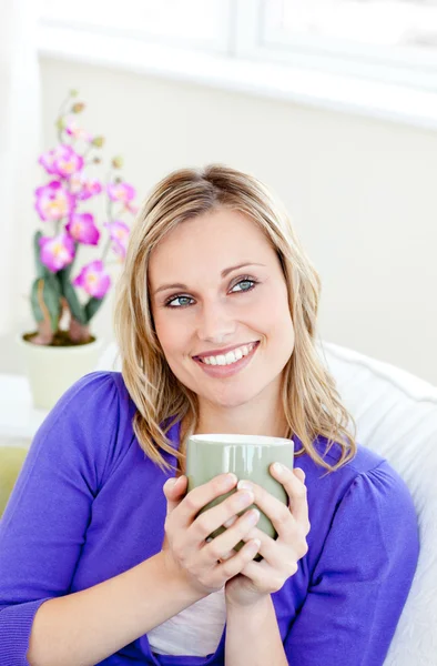 Charming woman holding cup — Stock Photo, Image