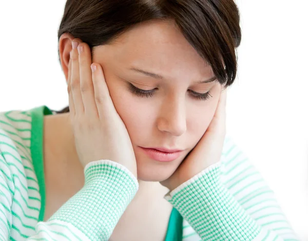 Portrait of a depressed teenager holding up her head on her hand — Stock Photo, Image