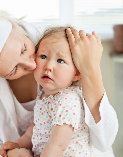 Mother taking care of her female child — Stock Photo, Image