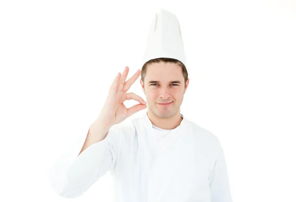 Красивий кухар дає сигнал руки — стокове фото