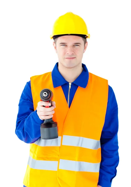 Fiatal férfi dolgozó visel sisakot és gazdaság unalmas gép — Stock Fotó