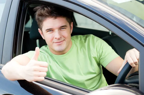 stock image Handsome male driver sitting in a car