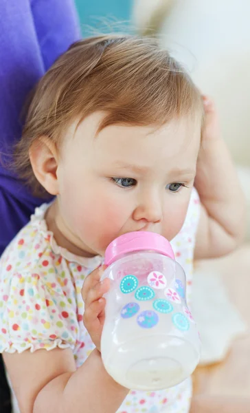 Young girl drinking Royalty Free Stock Images