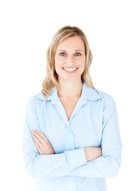 Self-assured businesswoman with folded arms smiling at the camer clipart