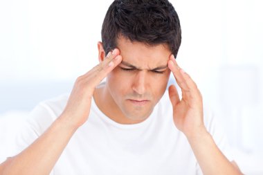 Portrait of a sick man having a migraine clipart