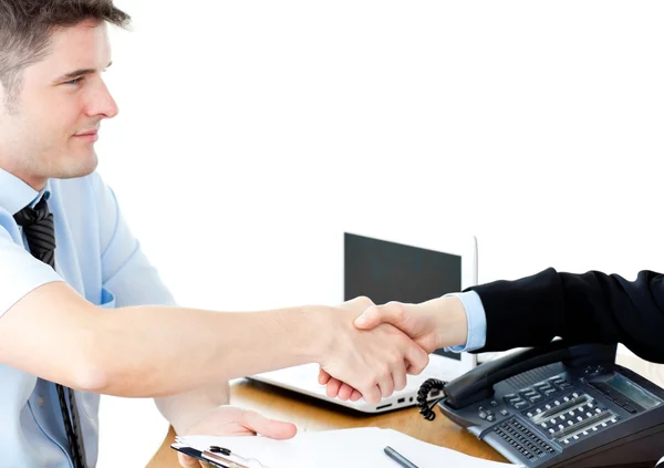 Assertive businesswoman shaking hands with a female customer — Stock Photo, Image