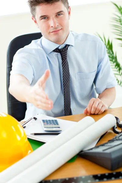 Confident businessman reaching his hand to the camera — Stock Photo, Image