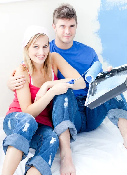 Loving couple painting a room together — Stock Photo, Image
