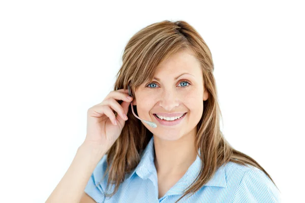 Delighted businesswoman talking on headphones — Stock Photo, Image