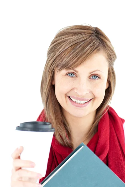 Cheerful caucasian woman holding a book and coffee — Stock Photo, Image