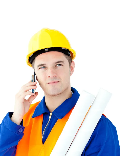 Ambitious male architect talking on phone holding blueprints — Stock Photo, Image