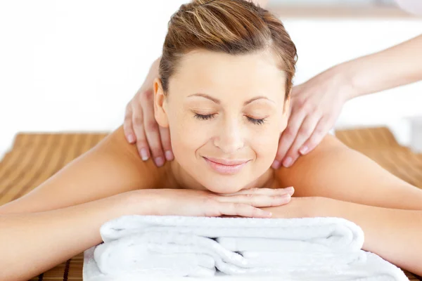 Resting young woman having a back massage — Stock Photo, Image