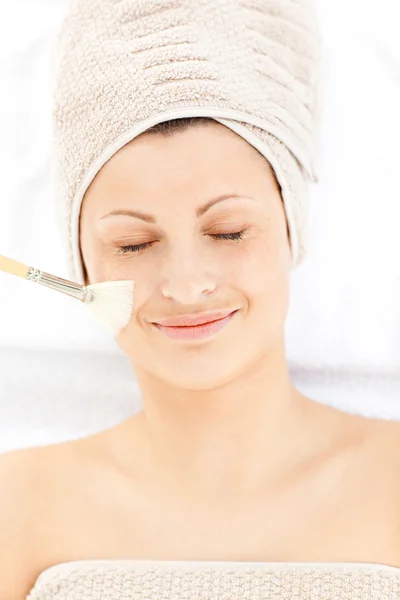 Charming relaxed woman receiving beauty treatment — Stock Photo, Image