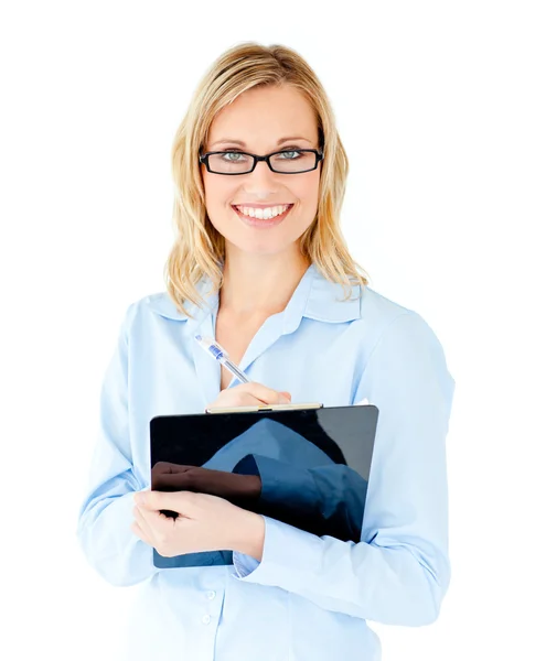Self-assured businesswoman holding clipboard — Stock Photo, Image