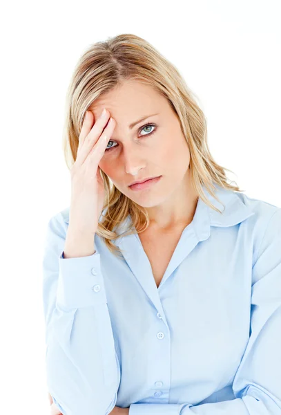 Caucasian businesswoman with a headache looking at the camera — Stock Photo, Image