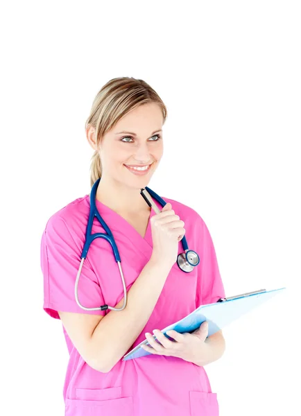 Ambitious female surgeon holding a clipboard — Stock Photo, Image