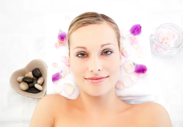 Close-up of a cute caucasian woman lying on a massage table — Stock Photo, Image